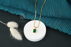 gold toned necklace with pendant