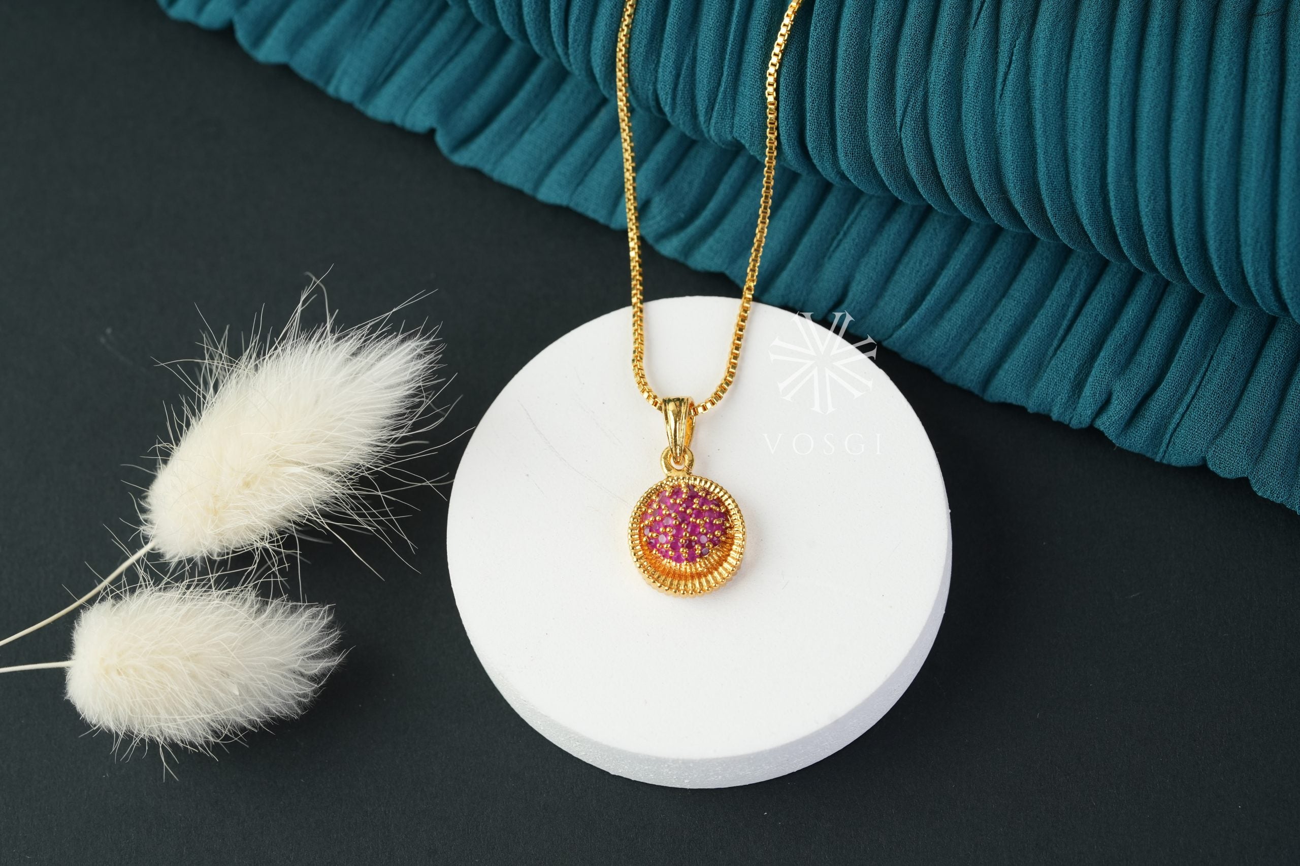 gold toned necklace with pendant