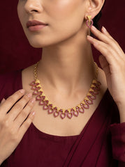Elegant Statement Necklace with Geometric Drop Motifs