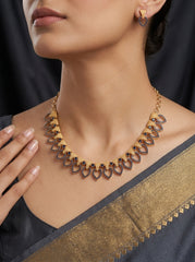 Elegant Statement Necklace with Geometric Drop Motifs