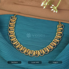 GOLD AND EMERALD TEMPLE NECKLACE